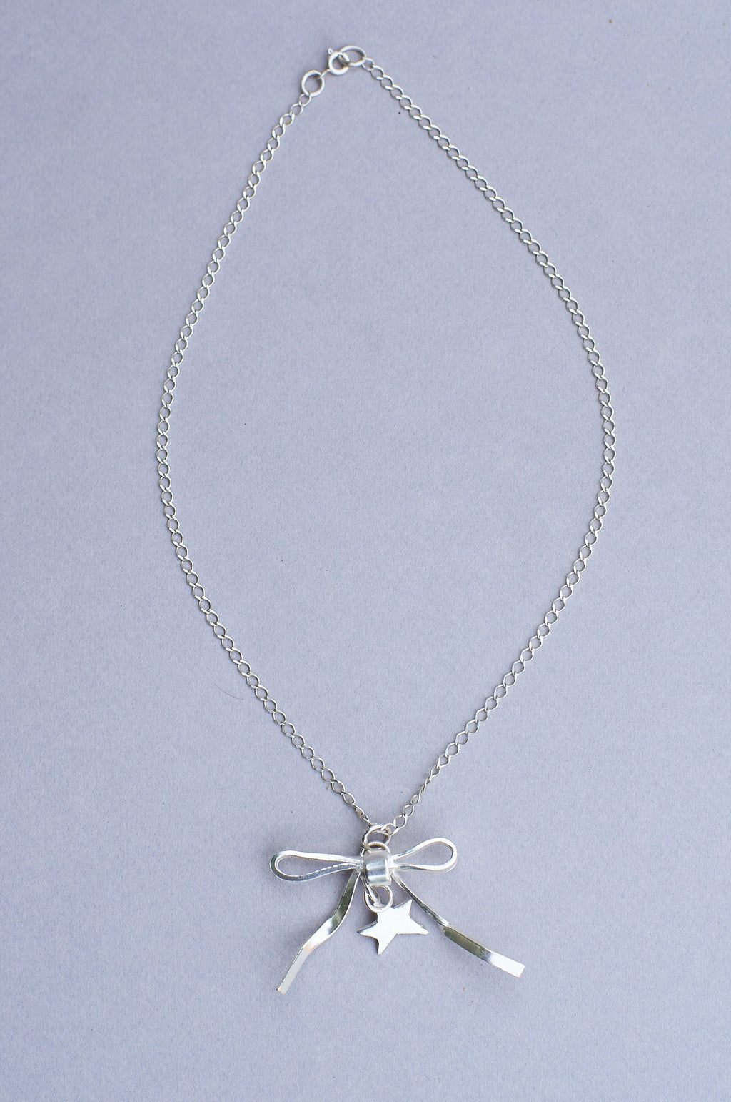 Bow Necklace with Dangling Star